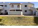 Charming condo building with stucco exterior and well-maintained landscaping at 850 S River Dr # 1085, Tempe, AZ 85281