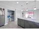 Modern kitchen with stainless steel appliances and a large island at 850 S River Dr # 1085, Tempe, AZ 85281