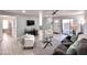 Open concept living room with stylish decor and ample seating at 850 S River Dr # 1085, Tempe, AZ 85281