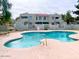 Community swimming pool with lounge chairs at the condominium complex at 850 S River Dr # 1085, Tempe, AZ 85281