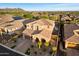 Charming home with lush desert landscaping and a tile roof at 8733 E Jacaranda St, Mesa, AZ 85207