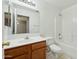 Bathroom with a white countertop, wood cabinets, and tile flooring at 89 S 151St Ave, Goodyear, AZ 85338