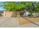 Charming single-story home with a well-manicured desert landscape and a two-car garage at 89 S 151St Ave, Goodyear, AZ 85338