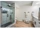Bright bathroom with large glass shower and modern vanity, a place to unwind and refresh at 9120 N 86Th Way, Scottsdale, AZ 85258
