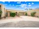 Contemporary home with desert landscaping, a two car garage, and a private courtyard at 9120 N 86Th Way, Scottsdale, AZ 85258