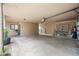 Spacious three car garage with ample storage, organization racks, and epoxy flooring at 9120 N 86Th Way, Scottsdale, AZ 85258