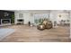 Bright living room features modern fireplace, wood floors, and large windows, creating a welcoming atmosphere at 9120 N 86Th Way, Scottsdale, AZ 85258