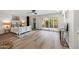 Serene main bedroom with a stylish bed, natural light, and a peaceful ambiance for relaxation at 9120 N 86Th Way, Scottsdale, AZ 85258