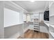 Spacious walk-in closet features modern shelving and a rod for hanging clothes at 9120 N 86Th Way, Scottsdale, AZ 85258