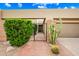 Brick walkway leading to a private courtyard and entrance, desert landscaping and mature trees at 9120 N 86Th Way, Scottsdale, AZ 85258