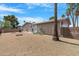 Large backyard showcasing desert landscaping, perfect for low-maintenance outdoor living and entertainment at 9349 E Navajo Pl, Sun Lakes, AZ 85248