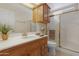 Bathroom featuring a shower, single vanity and toilet at 9349 E Navajo Pl, Sun Lakes, AZ 85248