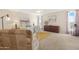 Large bedroom with carpeted floors, ceiling fan, and comfortable furnishings at 9349 E Navajo Pl, Sun Lakes, AZ 85248