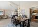 Elegant dining room with classic furniture and natural light at 9349 E Navajo Pl, Sun Lakes, AZ 85248