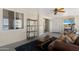 Warm sunroom featuring neutral colors, tile flooring and comfortable seating for relaxation and enjoyment at 9349 E Navajo Pl, Sun Lakes, AZ 85248