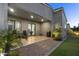 Cozy backyard patio with lush landscaping, outdoor seating, and a smooth transition to indoor spaces at 948 E La Mirada Dr, Phoenix, AZ 85042