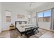 Serene bedroom featuring a comfortable bed, stylish decor, and plenty of natural light at 948 E La Mirada Dr, Phoenix, AZ 85042