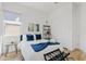 Comfortable bedroom featuring a queen bed, natural light, and a calming color scheme at 948 E La Mirada Dr, Phoenix, AZ 85042