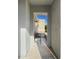 Inviting covered front porch with neutral tones, offering a cozy outdoor seating area at 948 E La Mirada Dr, Phoenix, AZ 85042