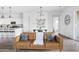 Inviting living area with open floor plan showcasing a stylish leather sofa and modern decor at 948 E La Mirada Dr, Phoenix, AZ 85042