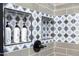 Close-up of the shower featuring tiled insets and shelving for toiletries at 948 E La Mirada Dr, Phoenix, AZ 85042
