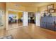 Versatile bonus room featuring hardwood floors, access to multiple rooms, and ample storage, perfect for many uses at 10005 N 1St Dr, Phoenix, AZ 85021