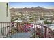 Picturesque city view from a balcony, featuring mountains, desert and lush bougainvillea at 10005 N 1St Dr, Phoenix, AZ 85021
