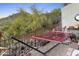 Outdoor space features a relaxing hammock surrounded by desert landscaping at 10005 N 1St Dr, Phoenix, AZ 85021