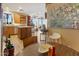 Open kitchen featuring stainless steel appliances, an island, and a view to the living area at 10005 N 1St Dr, Phoenix, AZ 85021