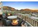Inviting outdoor seating area with mountain views and cozy fire pits at 10005 N 1St Dr, Phoenix, AZ 85021