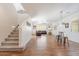 Open living room with wood floors, staircase, and comfortable seating area at 10417 W Alyssa Ln, Peoria, AZ 85383