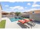 Enjoy resort-style living with a private pool, spa, and lounge chairs in this backyard oasis at 10417 W Alyssa Ln, Peoria, AZ 85383