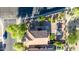 Overhead shot showcases the landscaped backyard with gazebo, desert elements, and outdoor relaxation area at 10561 E Plata Ave, Mesa, AZ 85212