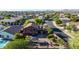 Spacious two-story home featuring a cozy backyard area with a gazebo and mature landscaping at 10561 E Plata Ave, Mesa, AZ 85212