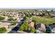 Neighborhood home in a Gathering-friendly location near a green park with sports field and community amenities at 10561 E Plata Ave, Mesa, AZ 85212