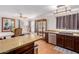 This spacious kitchen connects to the dining room, giving the home an open and airy feel at 10561 E Plata Ave, Mesa, AZ 85212