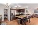 This lovely kitchen features granite countertops, an island with barstool seating, and stainless steel appliances at 10561 E Plata Ave, Mesa, AZ 85212