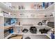 This large pantry is equipped with tons of shelf space perfect for any homeowner at 10561 E Plata Ave, Mesa, AZ 85212