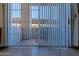 Bright balcony with sliding glass doors and vertical blinds, offering outdoor space at 11333 N 92Nd St # 1085, Scottsdale, AZ 85260