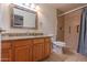 Clean bathroom with granite vanity, tile floor, and glass-enclosed shower at 11333 N 92Nd St # 1085, Scottsdale, AZ 85260