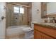 Bathroom features vanity with granite countertop, glass shower door, and tiled floor at 11333 N 92Nd St # 1085, Scottsdale, AZ 85260