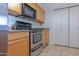 Kitchen features stainless steel appliances, granite countertops, and ample storage space at 11333 N 92Nd St # 1085, Scottsdale, AZ 85260