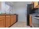 Bright kitchen with stainless steel appliances, stone countertops, and neutral tile flooring at 11333 N 92Nd St # 1085, Scottsdale, AZ 85260