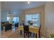 Bright living room with a dining table, rug, large window, and comfortable seating area at 11333 N 92Nd St # 1085, Scottsdale, AZ 85260