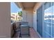 Cozy outdoor patio features tile flooring and seating with a view of the complex at 11333 N 92Nd St # 1085, Scottsdale, AZ 85260