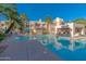 Community pool offers a refreshing escape with palm trees and ample lounge seating at 11333 N 92Nd St # 1085, Scottsdale, AZ 85260