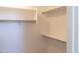 Walk-in closet with white shelving for maximum storage and organization at 13549 W Paso Trl, Peoria, AZ 85383