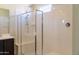 Bright bathroom shower with glass enclosure and dual shower heads at 13549 W Paso Trl, Peoria, AZ 85383