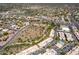 Aerial view showcasing an expansive desert landscape with residential areas and convenient road networks at 13700 N Fountain Hills Blvd # 135, Fountain Hills, AZ 85268