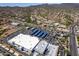Wide aerial view of commercial buildings, roads, and a desert landscape, offering a broad sense of location at 13700 N Fountain Hills Blvd # 135, Fountain Hills, AZ 85268